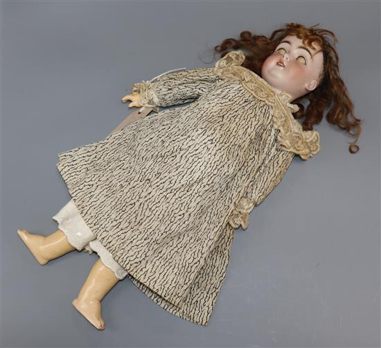 A Kestner 152 bisque head doll, original clothes, height 20in.